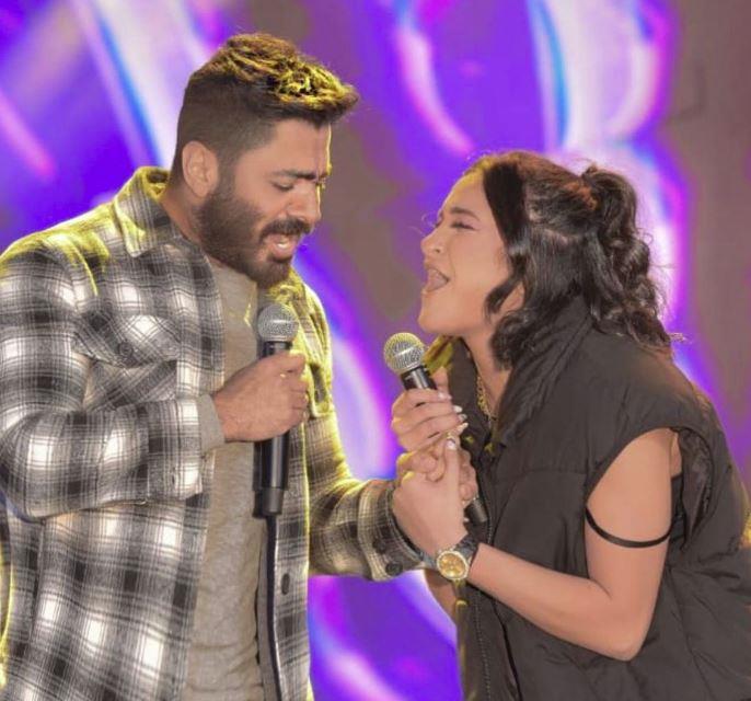 Pictures| Tamer Hosny presents a singing talent for the first time at the University of the Future concert